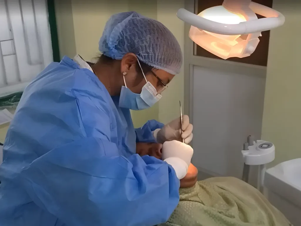 Dr. V. Divyashree performing CBCT-guided dental implant surgery at Dentick Dental Care, Bengaluru